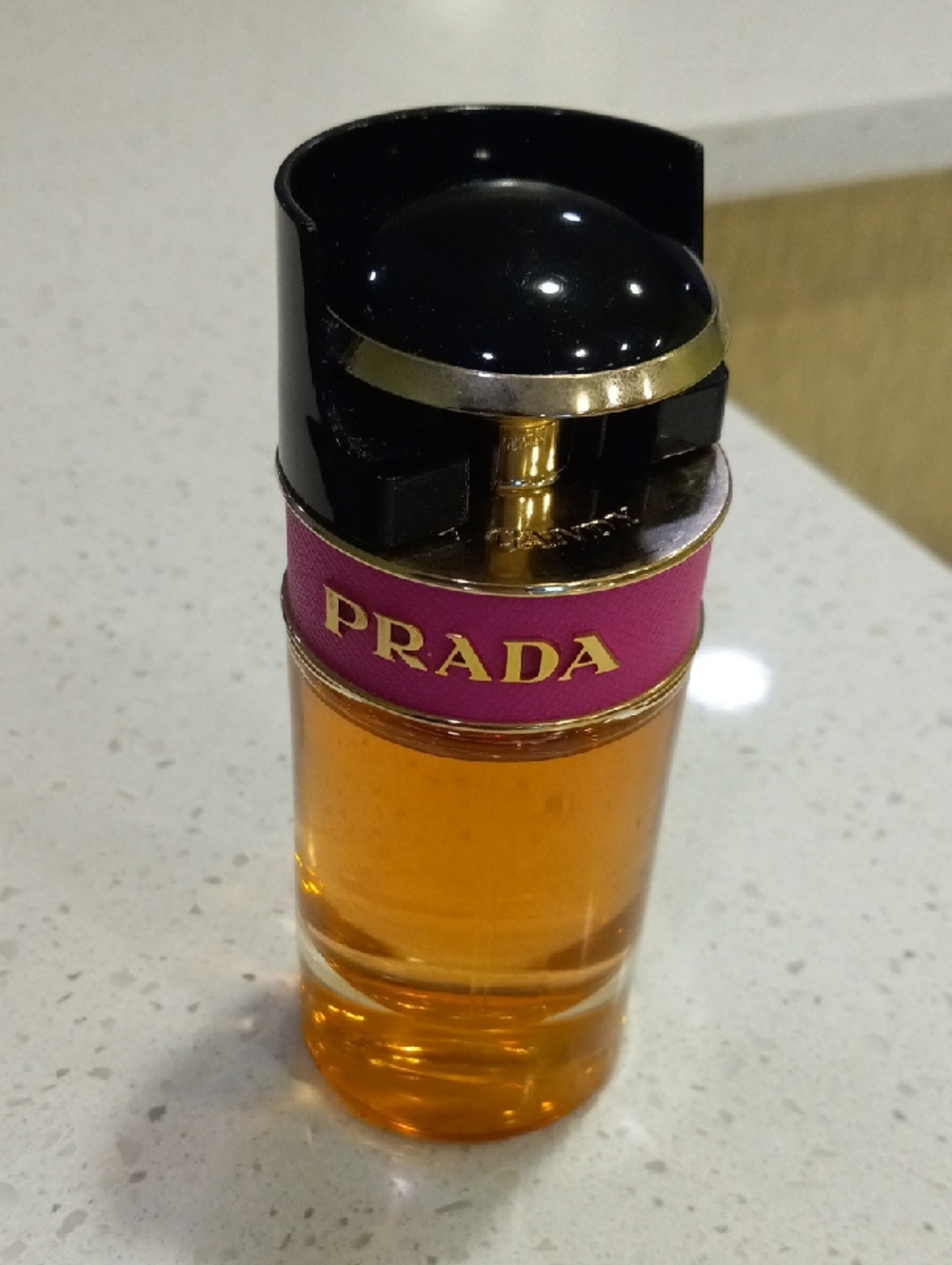 Prada Women Perfume with Pink Band and Gold Trim